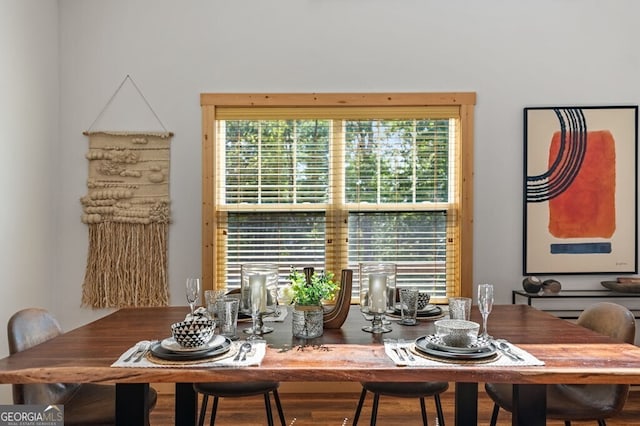 dining room with hardwood / wood-style flooring