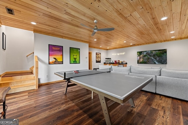 playroom featuring dark hardwood / wood-style flooring, ceiling fan, and wood ceiling