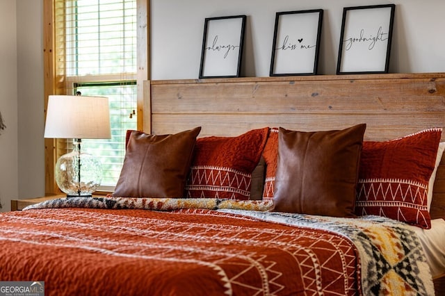 bedroom featuring multiple windows