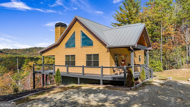 exterior space featuring a wooden deck and french doors