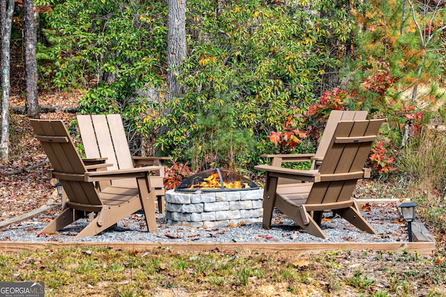 view of patio / terrace with an outdoor fire pit