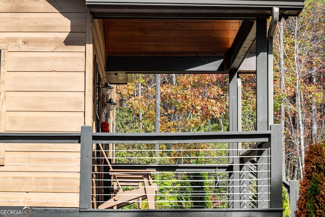 exterior space with wood walls and wooden ceiling