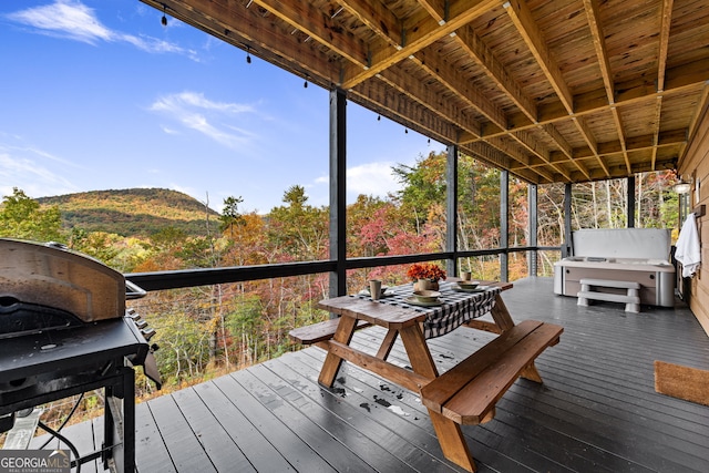 wooden deck with area for grilling