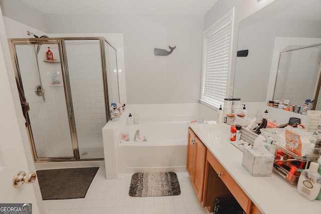 bathroom with plus walk in shower and vanity