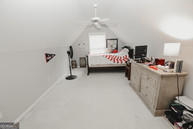 bedroom featuring lofted ceiling, ceiling fan, and light carpet