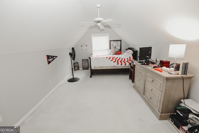 bedroom featuring baseboards, ceiling fan, vaulted ceiling, and light carpet