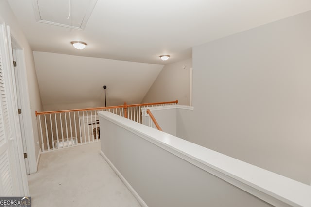 corridor featuring lofted ceiling