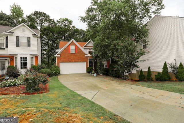 view of front of house featuring a front yard, an attached garage, brick siding, and concrete driveway