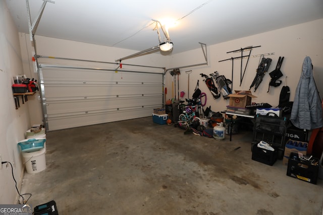 garage featuring a garage door opener