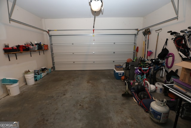 garage featuring a garage door opener