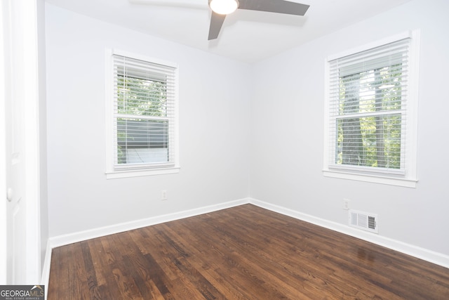 empty room with ceiling fan and wood-type flooring