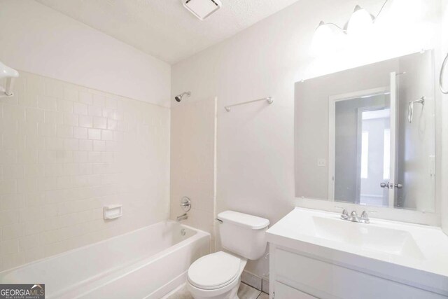 bathroom featuring visible vents, vanity, toilet, and washtub / shower combination