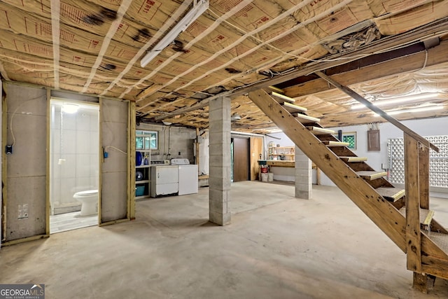 basement with separate washer and dryer and plenty of natural light