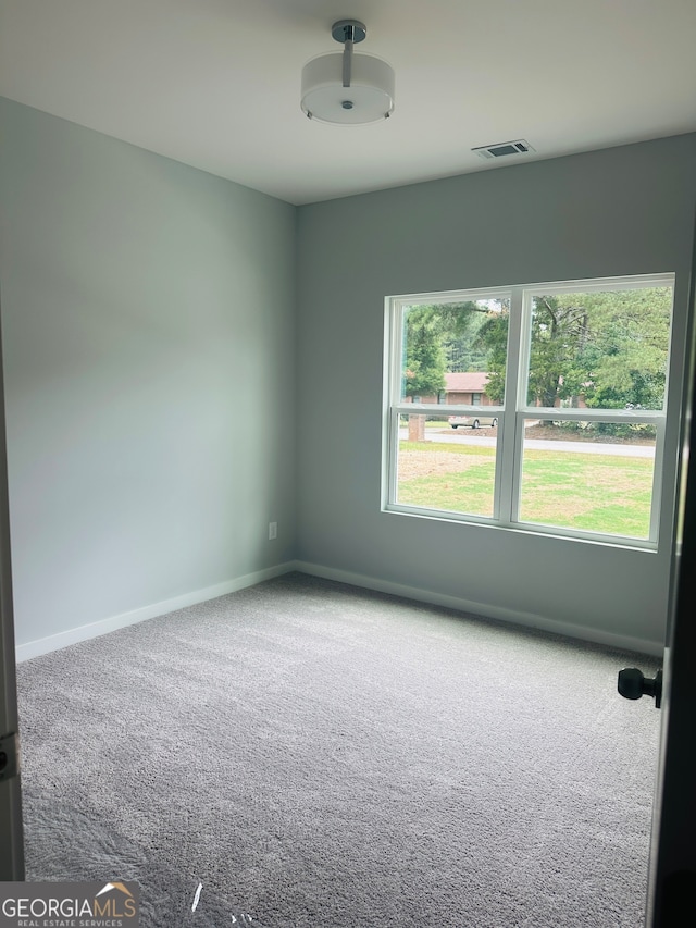 empty room with carpet floors