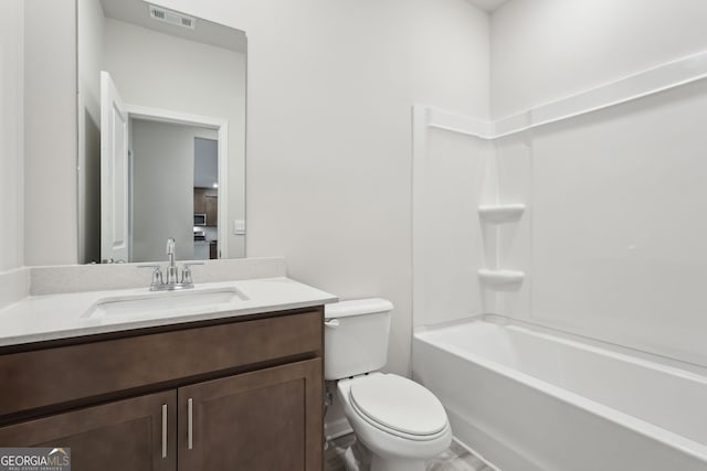 full bathroom featuring vanity, toilet, and bathtub / shower combination