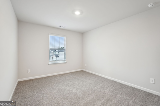 view of carpeted spare room