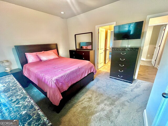 bedroom featuring carpet floors