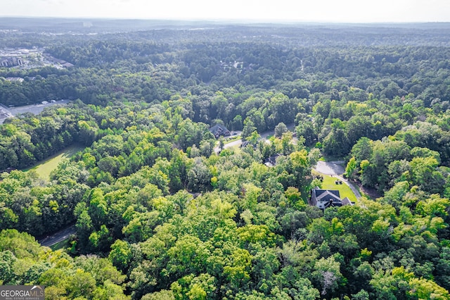 aerial view with a wooded view