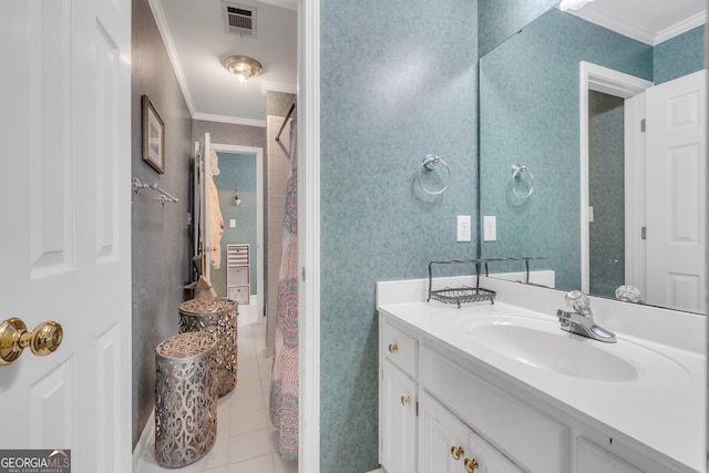 bathroom featuring crown molding, visible vents, tile patterned floors, and wallpapered walls
