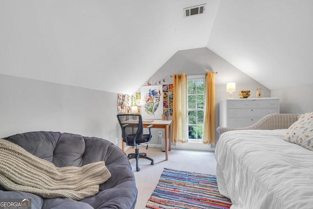 carpeted bedroom featuring visible vents and vaulted ceiling