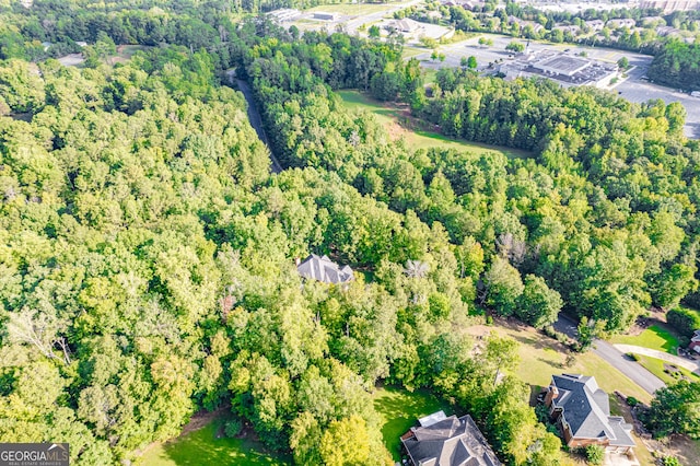 aerial view featuring a view of trees