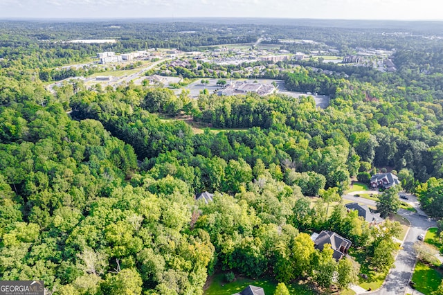 bird's eye view with a view of trees