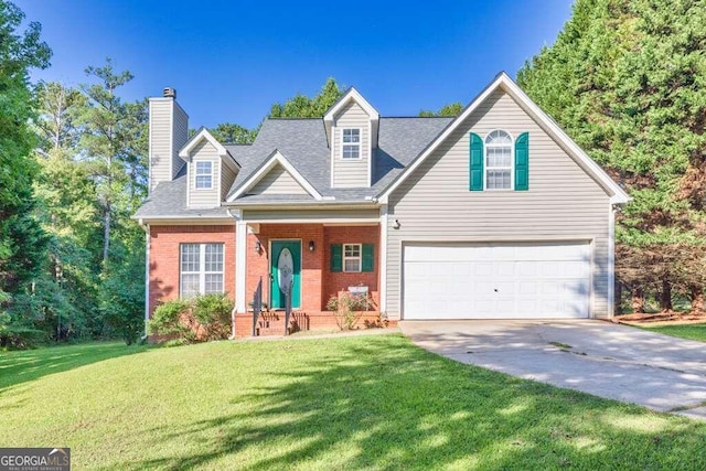 view of front of home with a garage, a front yard, and covered porch