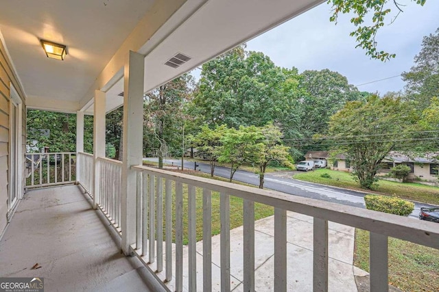 balcony featuring a porch