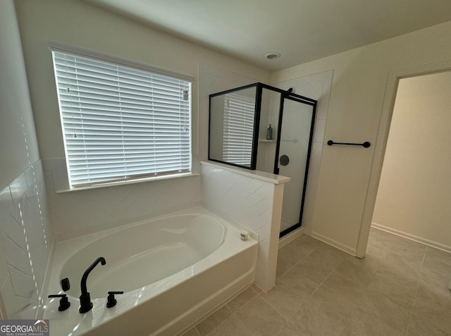 bathroom with plus walk in shower and tile patterned floors