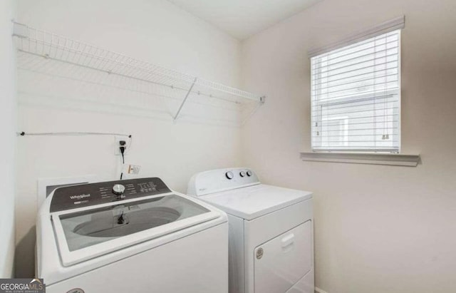 laundry room with washer and clothes dryer