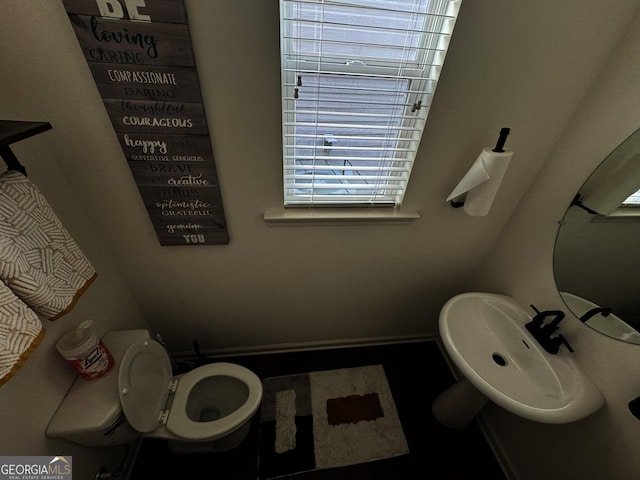 bathroom featuring toilet