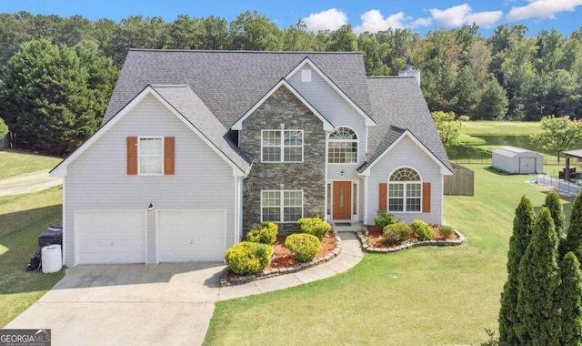 front facade with a front yard and a garage