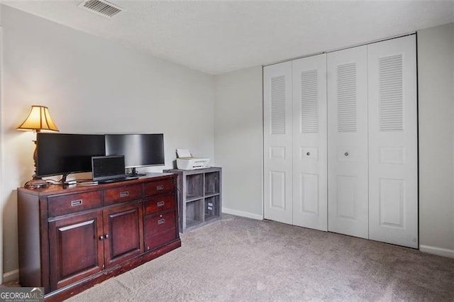 home office with light carpet