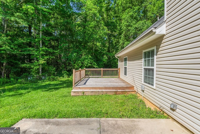 view of yard featuring a deck