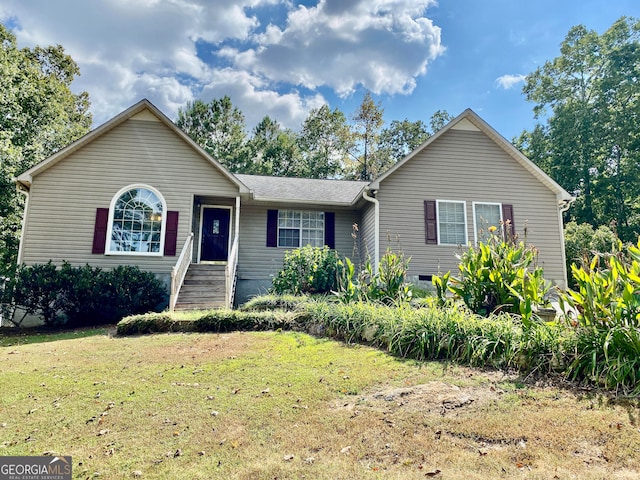 single story home with a front lawn