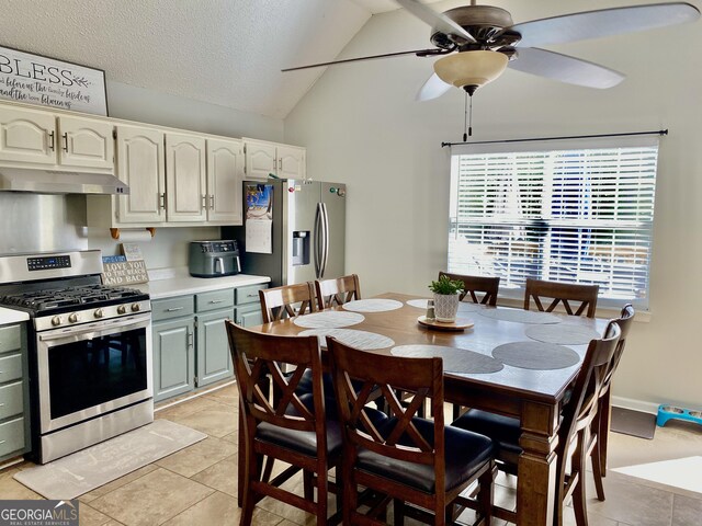 1832 Wayside Rd, Kingston, GA 30145 - dining space with a ceiling fan, a textured ceiling, light tile patterned floors, and vaulted ceiling