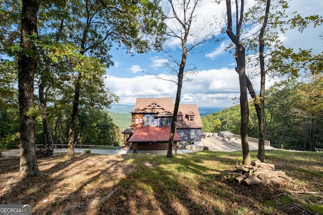 view of yard featuring a wooden deck