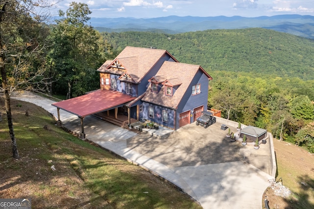 drone / aerial view featuring a mountain view