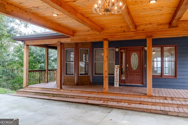 doorway to property featuring ceiling fan