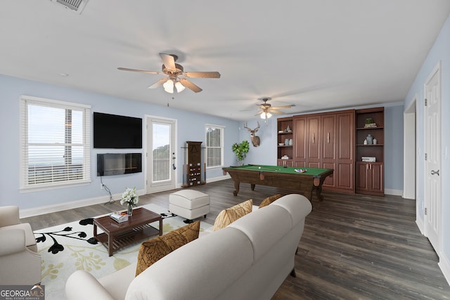 living room featuring ceiling fan, dark hardwood / wood-style flooring, and billiards