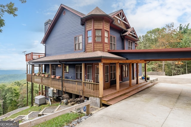 exterior space featuring a carport