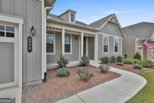 view of front facade featuring a garage and covered porch