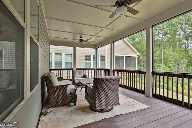 exterior space with ceiling fan