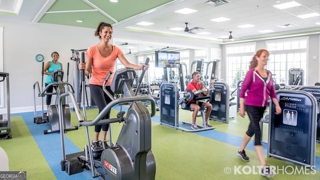 exercise room with ceiling fan