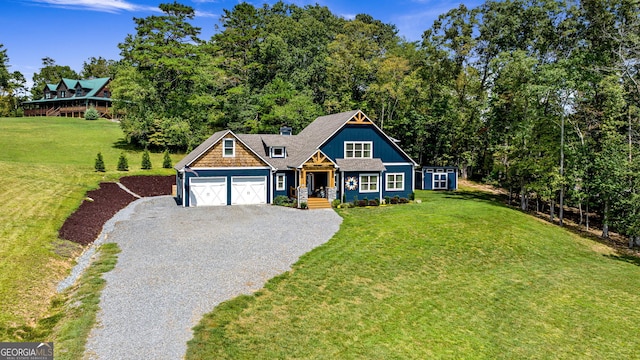 view of front facade featuring a front lawn, a porch, and a garage