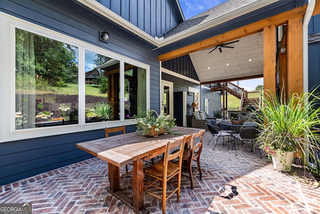 view of patio featuring ceiling fan