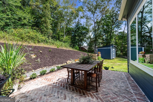 view of patio featuring a storage shed