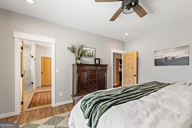 bedroom with light hardwood / wood-style flooring and ceiling fan