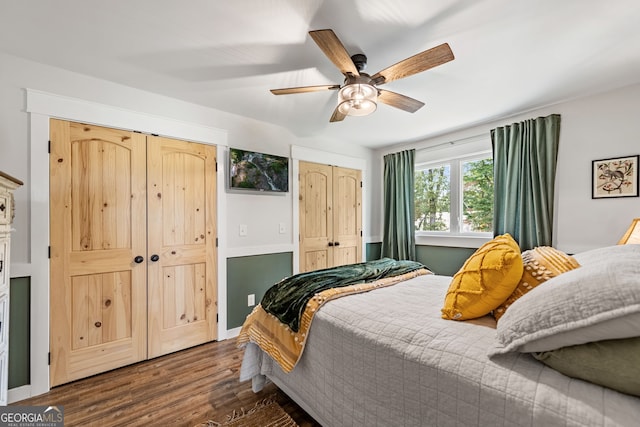 bedroom featuring ceiling fan and dark hardwood / wood-style flooring