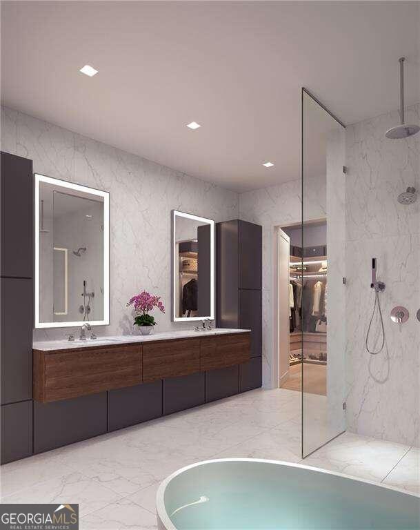 bathroom with vanity and separate shower and tub